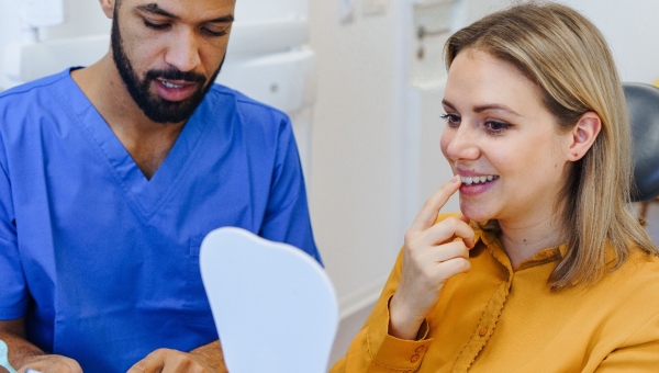 A dentist educating their patient using OrthoPhoto